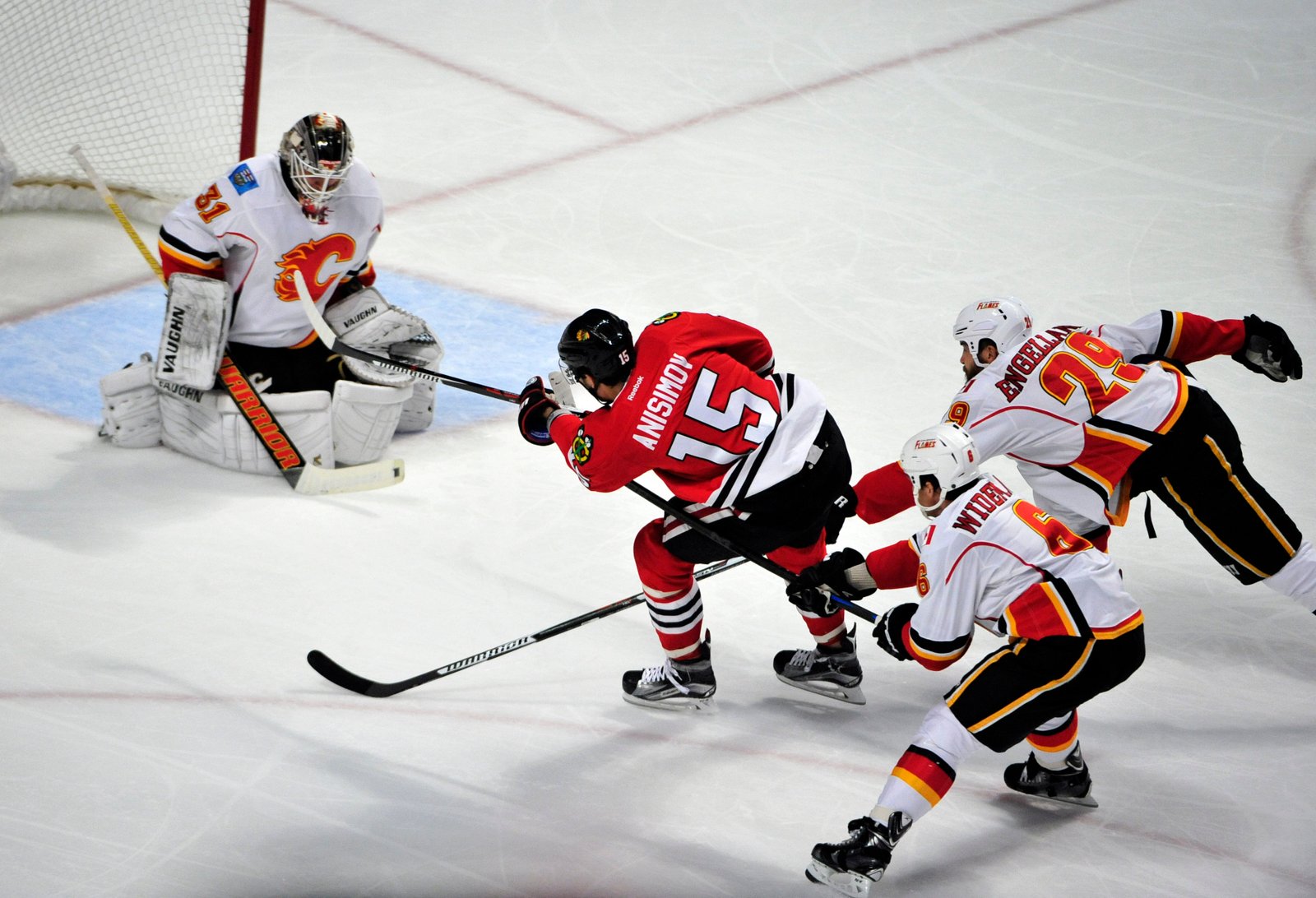 What the World Needs Now is Another Folk Singer: Blackhawks 4, Flames 1